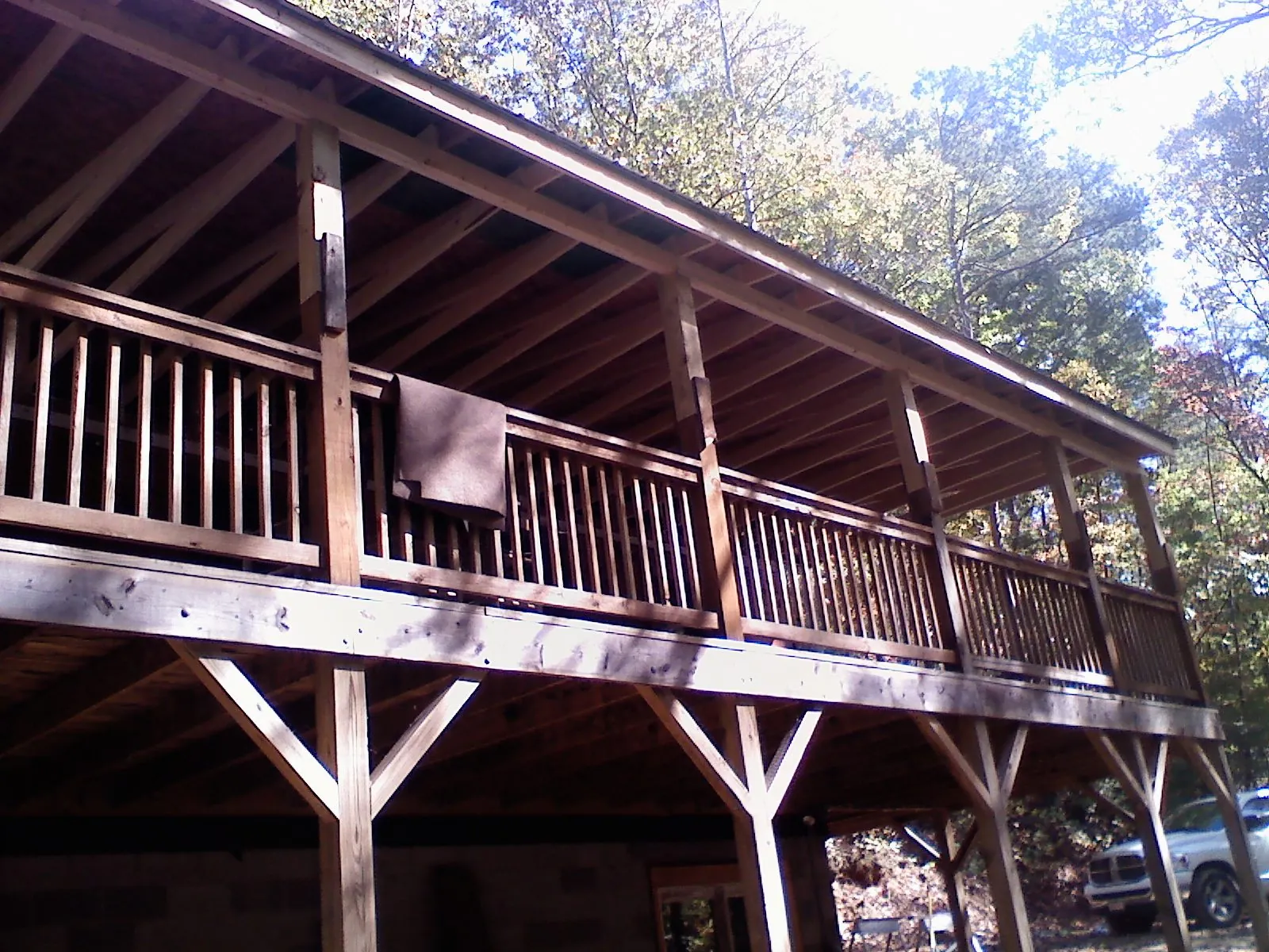 Timber framing under a new elevated porch and deck — Roof Leak Repair in Kilmarnock by Roofing Brothers